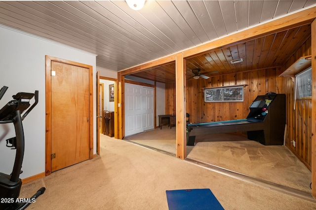 exercise area with billiards, carpet, wooden ceiling, and wooden walls