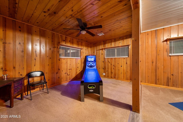 recreation room featuring baseboards, carpet flooring, wood ceiling, and visible vents