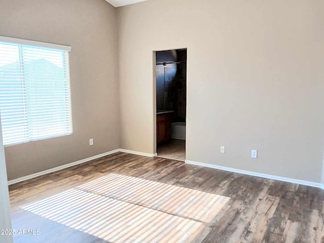 empty room featuring hardwood / wood-style floors