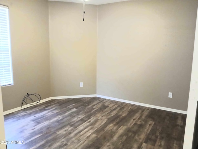 empty room featuring dark hardwood / wood-style floors