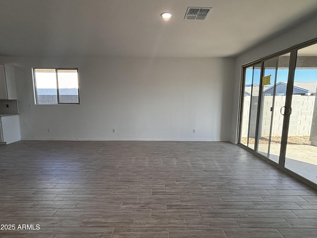 unfurnished room with a wealth of natural light