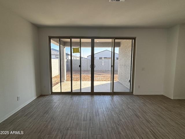 unfurnished room with a healthy amount of sunlight