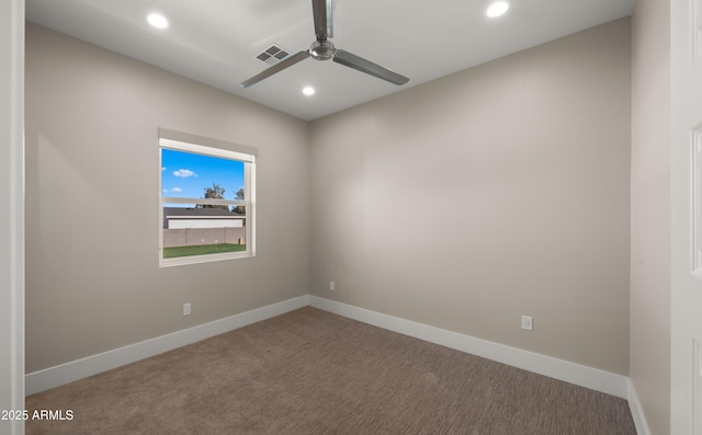 carpeted empty room with ceiling fan