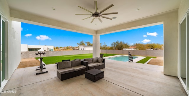 view of patio / terrace with an outdoor hangout area, a fenced in pool, and ceiling fan