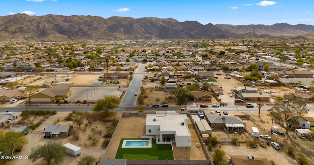 drone / aerial view featuring a mountain view