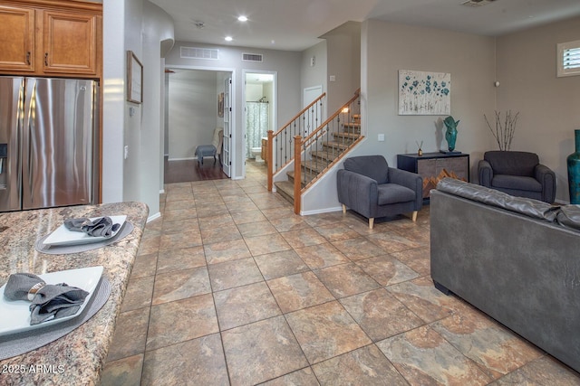 7252 E Nance St, Mesa, AZ 85207 - living area with stairway, light stone finish floors, and recessed lighting