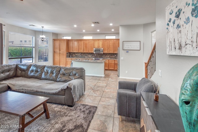 7252 E Nance St, Mesa, AZ 85207 - living area with a chandelier, stairs, recessed lighting, and light tile patterned floors