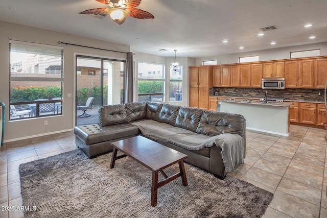 7252 E Nance St, Mesa, AZ 85207 - living room with recessed lighting, light tile patterned floors, and ceiling fan