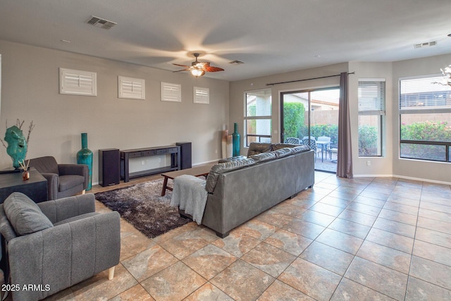 7252 E Nance St, Mesa, AZ 85207 - living room with a ceiling fan and baseboards