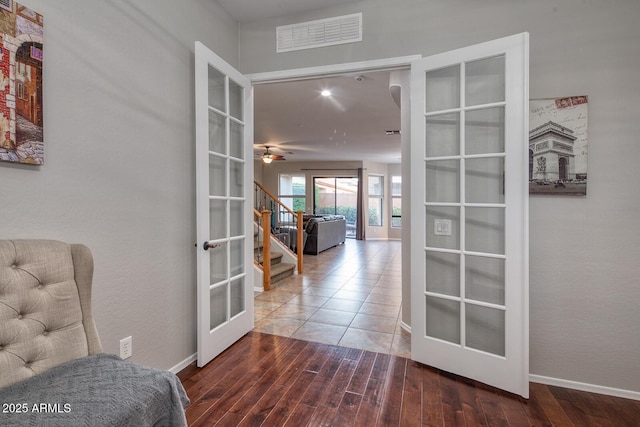 7252 E Nance St, Mesa, AZ 85207 - living area with french doors, stairway, and wood finished floors