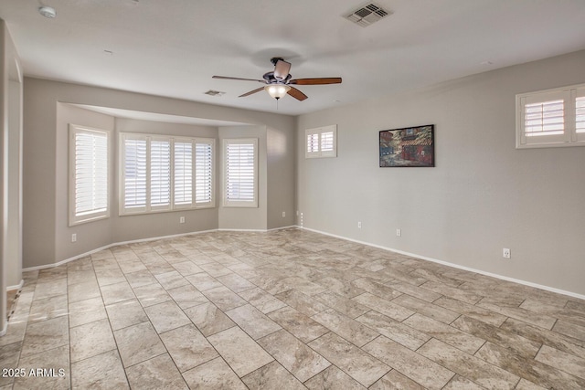 7252 E Nance St, Mesa, AZ 85207 - empty room with ceiling fan, plenty of natural light, and a smoke detector