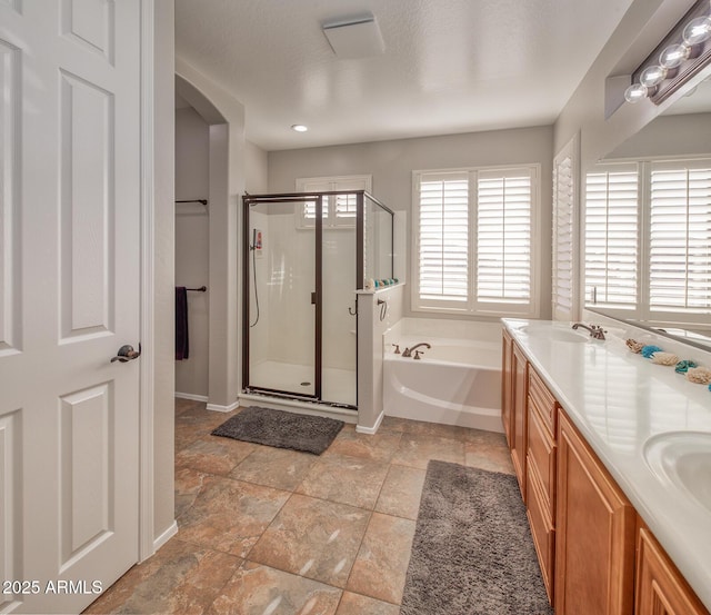 7252 E Nance St, Mesa, AZ 85207 - full bathroom with a shower stall, a bath, stone finish floors, and double vanity