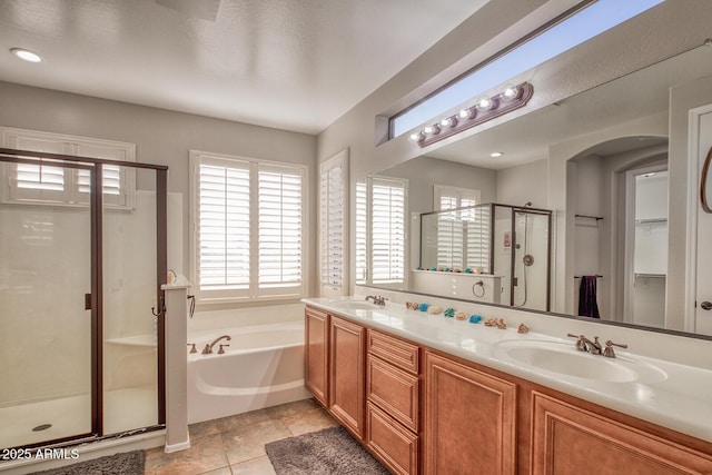 7252 E Nance St, Mesa, AZ 85207 - full bathroom with a shower stall, a garden tub, double vanity, and tile patterned flooring