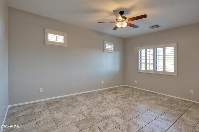 7252 E Nance St, Mesa, AZ 85207 - spare room featuring plenty of natural light and ceiling fan