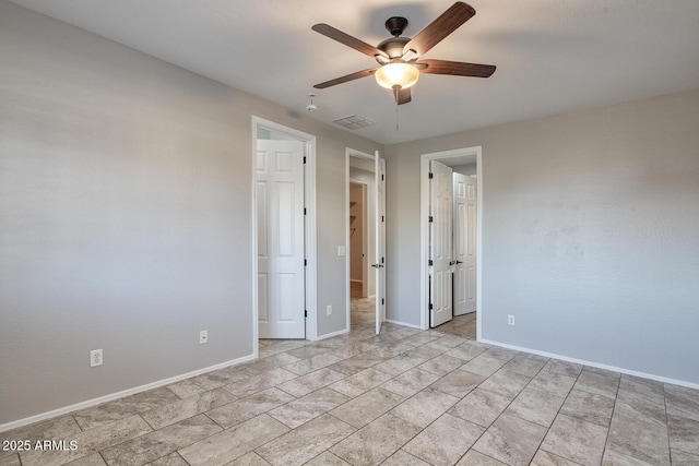 7252 E Nance St, Mesa, AZ 85207 - spare room featuring ceiling fan and baseboards