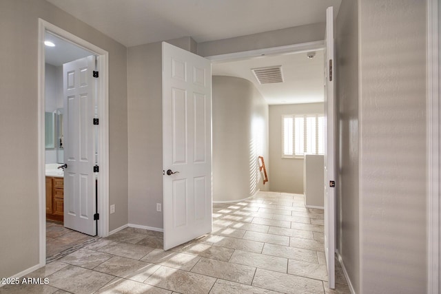 7252 E Nance St, Mesa, AZ 85207 - hall with baseboards and an upstairs landing