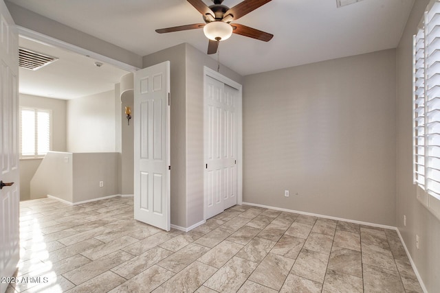 7252 E Nance St, Mesa, AZ 85207 - unfurnished bedroom featuring a closet and ceiling fan