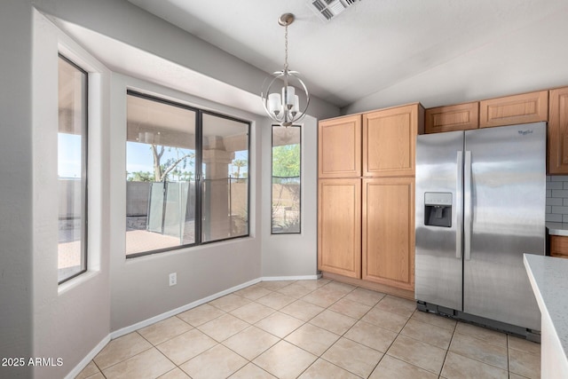 3002 S Marigold Pl, Chandler, AZ 85248 - unfurnished dining area featuring light tile patterned floors, a notable chandelier, visible vents, and vaulted ceiling