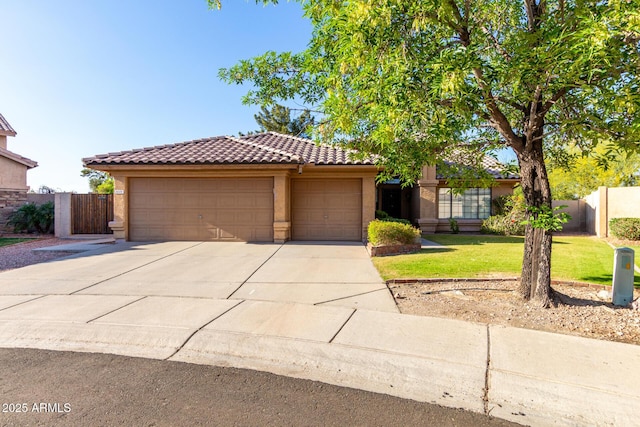 3002 S Marigold Pl, Chandler, AZ 85248 - view of front of property featuring a tile roof, an attached garage, stucco siding, and driveway