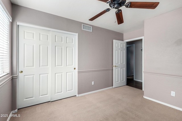 3002 S Marigold Pl, Chandler, AZ 85248 - unfurnished bedroom with multiple windows, carpet flooring, a closet, and visible vents