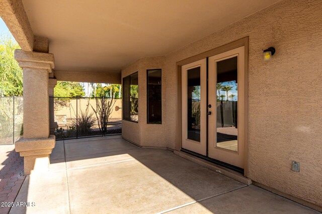 3002 S Marigold Pl, Chandler, AZ 85248 - view of patio / terrace with fence and french doors