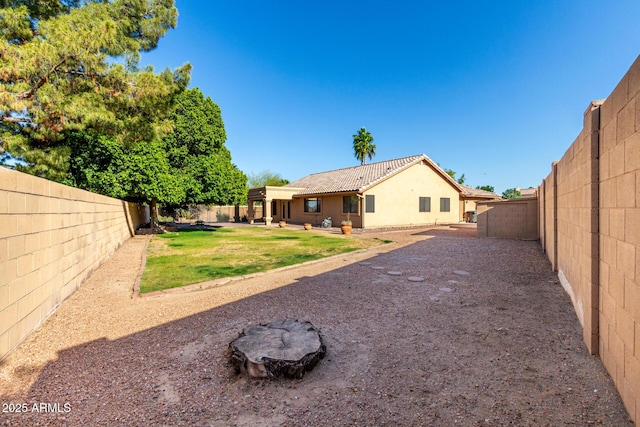 3002 S Marigold Pl, Chandler, AZ 85248 - back of house with stucco siding, a patio area, and a fenced backyard