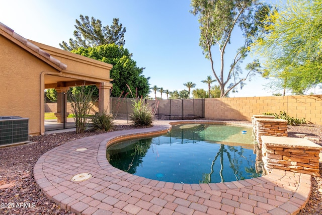 3002 S Marigold Pl, Chandler, AZ 85248 - view of swimming pool with central AC unit, a fenced in pool, and a fenced backyard