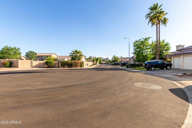 3002 S Marigold Pl, Chandler, AZ 85248 - view of street featuring curbs, a residential view, sidewalks, and street lights