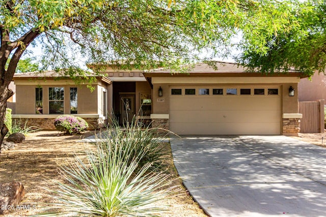 3387 E Bluejay Dr, Chandler, AZ 85286 - ranch-style house featuring stucco siding, driveway, stone siding, and an attached garage
