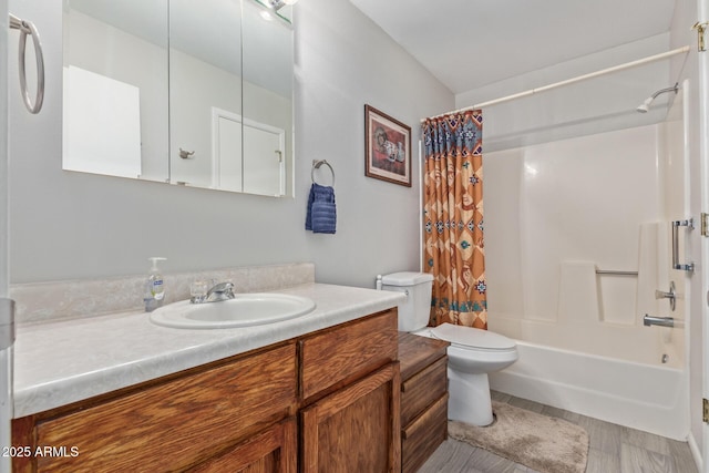 full bathroom featuring vanity, shower / bath combination with curtain, and toilet