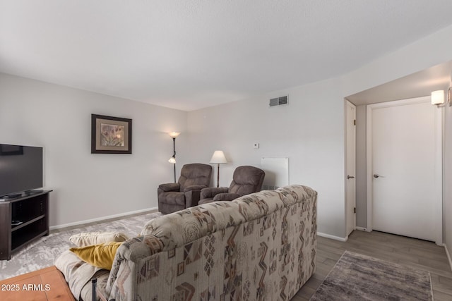 living room with hardwood / wood-style floors