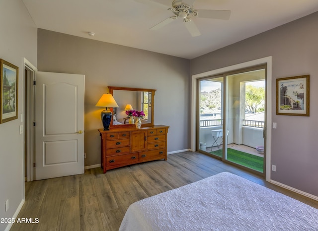 bedroom featuring light wood-type flooring, access to outside, baseboards, and ceiling fan