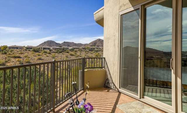 balcony featuring a mountain view