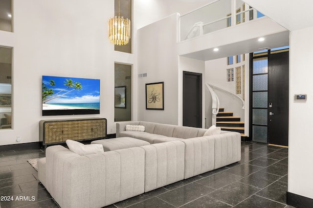 living room featuring a towering ceiling