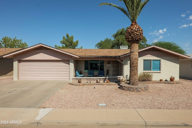 single story home featuring a garage