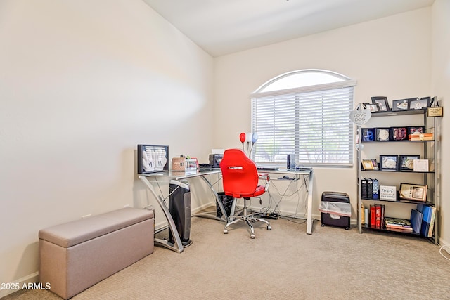 home office with baseboards and carpet