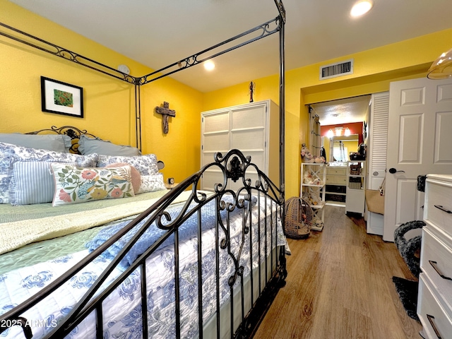 4554 E Paradise Village Pkwy N Unit 133, Phoenix, AZ 85032 - bedroom featuring wood finished floors