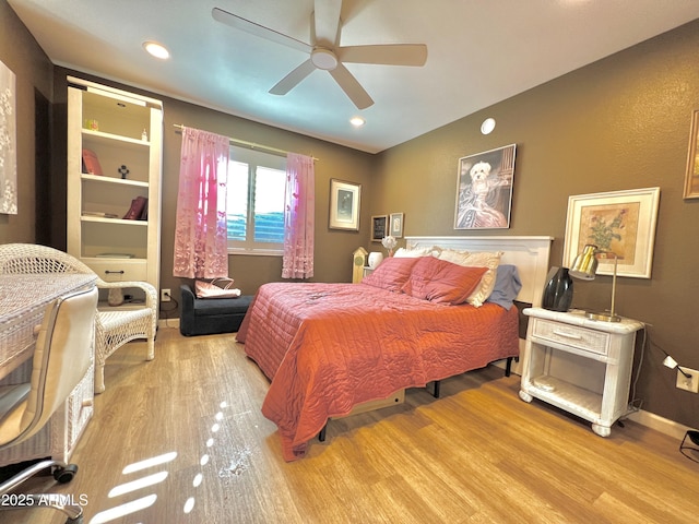 4554 E Paradise Village Pkwy N Unit 133, Phoenix, AZ 85032 - bedroom featuring wood finished floors, a ceiling fan, and recessed lighting