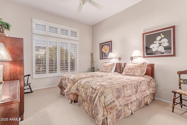 bedroom featuring carpet flooring, baseboards, and ceiling fan