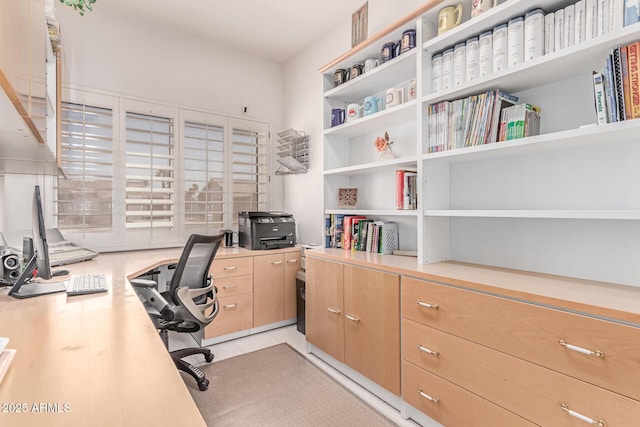 office with light tile patterned floors