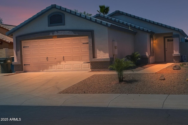 3014 W Zachary Dr, Phoenix, AZ 85027 - single story home with a garage, stucco siding, driveway, and a tiled roof