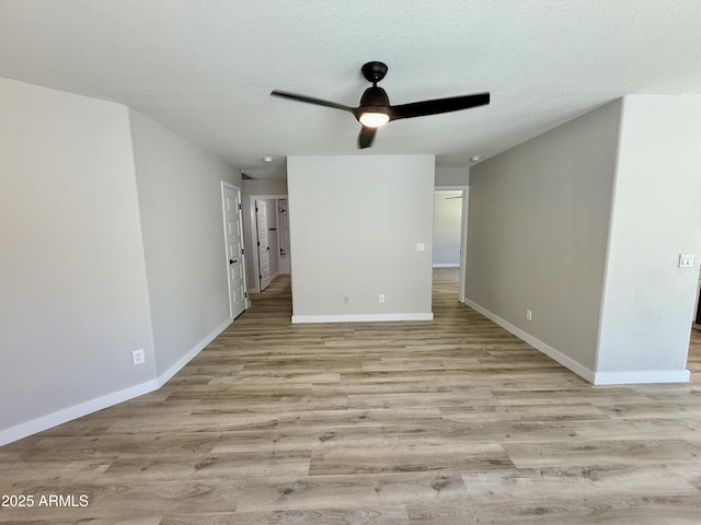 3014 W Zachary Dr, Phoenix, AZ 85027 - spare room with ceiling fan and light wood-style flooring