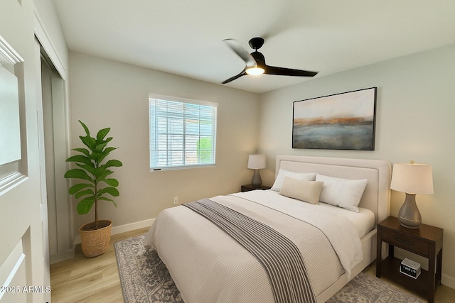 3014 W Zachary Dr, Phoenix, AZ 85027 - bedroom featuring wood finished floors, a closet, and a ceiling fan