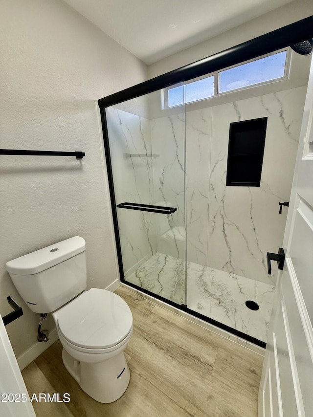 3014 W Zachary Dr, Phoenix, AZ 85027 - bathroom with a marble finish shower and wood finished floors