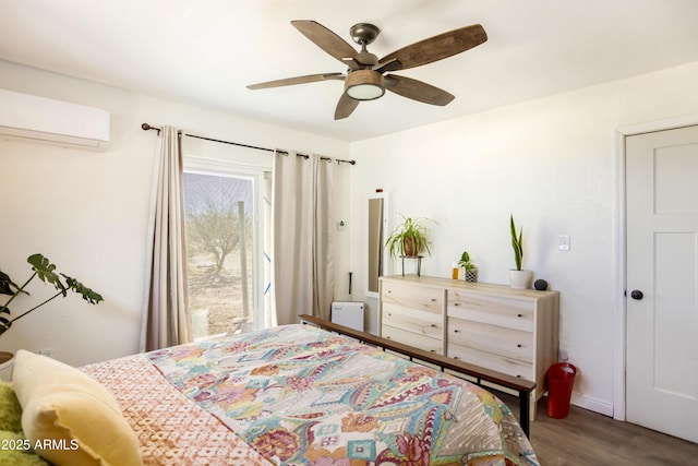 bedroom featuring a wall unit AC, ceiling fan, and hardwood / wood-style floors