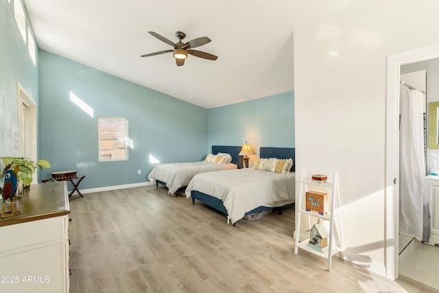 bedroom with ceiling fan and light wood-type flooring