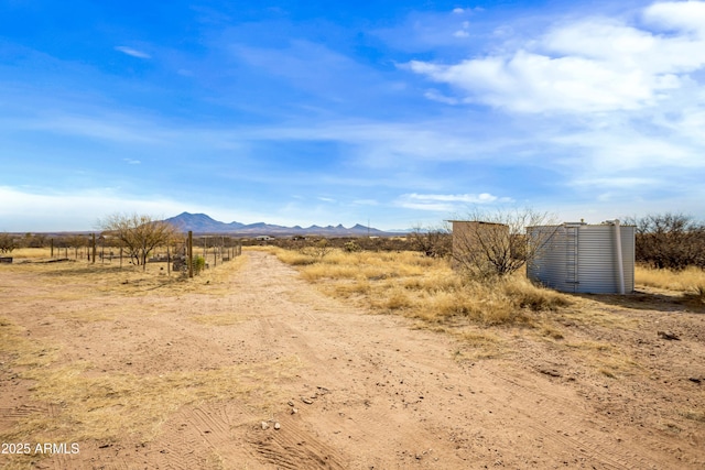 view of road featuring a mountain view and a rural view