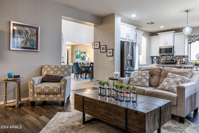 living room with dark wood-type flooring