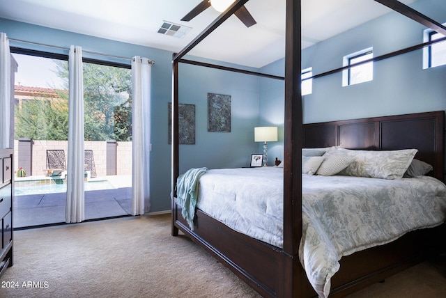 bedroom featuring light carpet, ceiling fan, and access to exterior