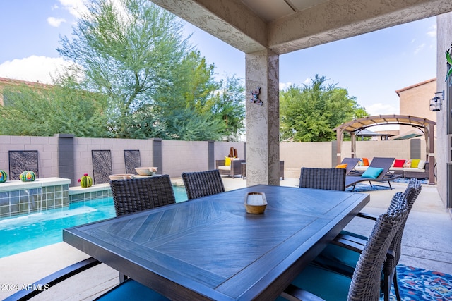 view of patio / terrace with a pergola, a fenced in pool, and pool water feature